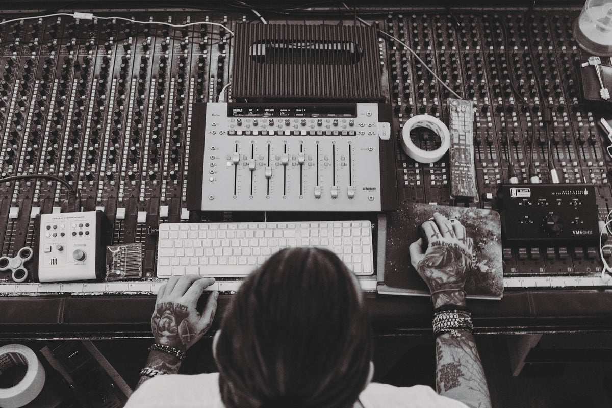 Studio desk with mixing console and monitors, top-down view